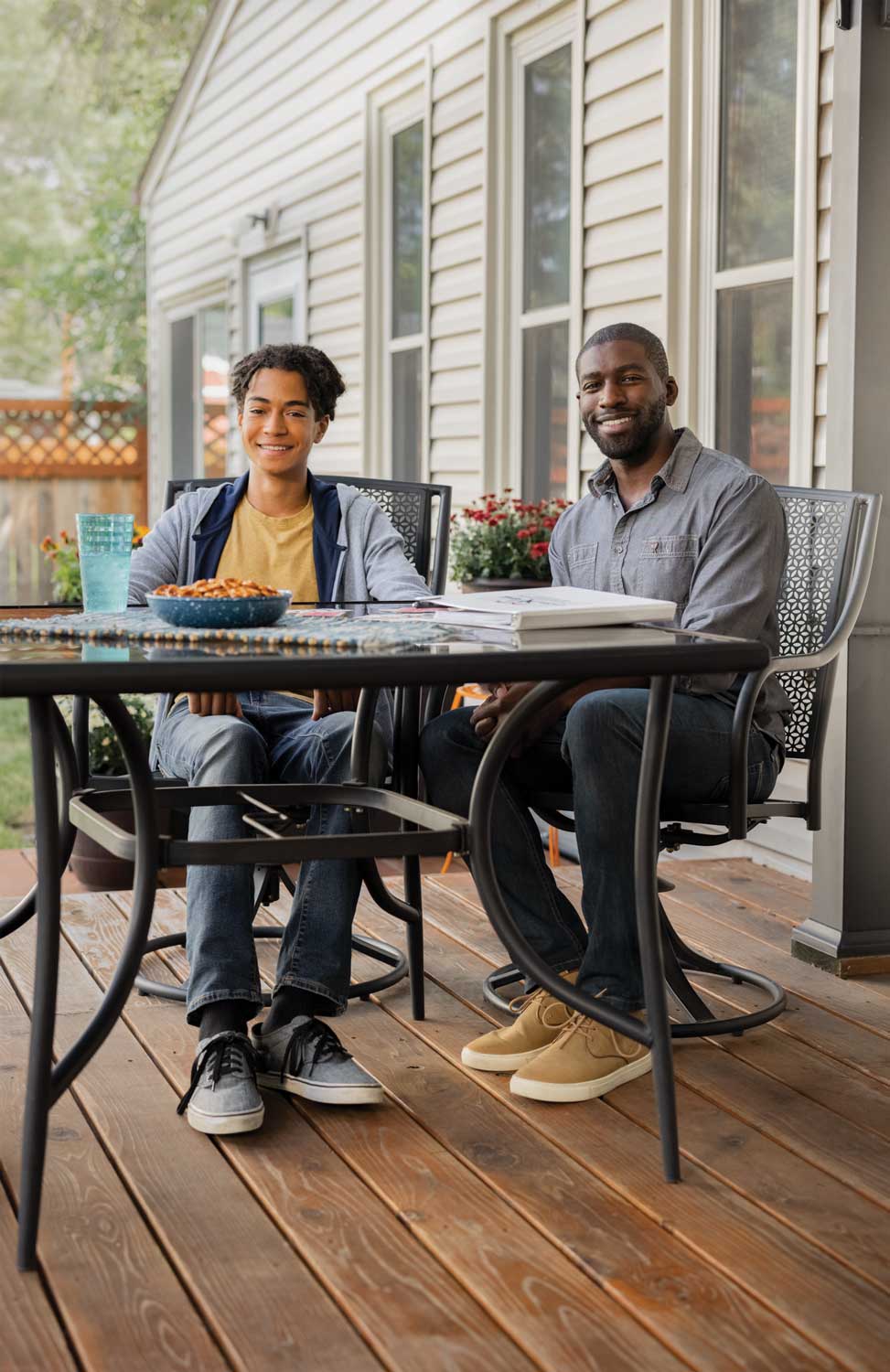 man-and-teen-on-porch