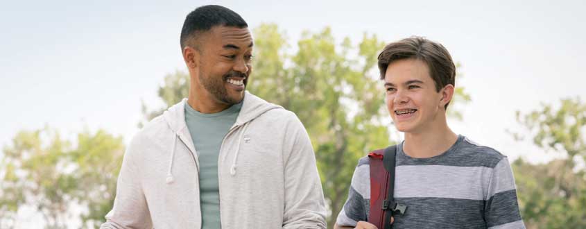 man-and-teen-walking